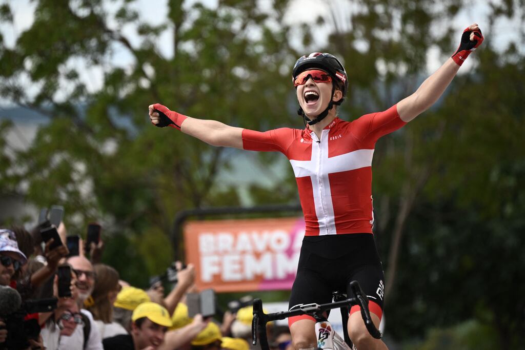 Danish rider Cecilie Uttrup Ludwig celebrates as she wins stage three of the Tour de France Femmes between Reims and Epernay. Photograph: Jeff Pachoud/AFP via Getty Images