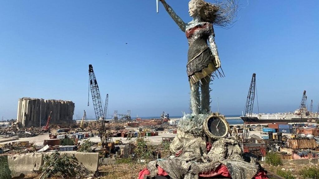 Artist Hayat Nazer collected broken glass and twisted materials that belonged to people’s homes before the Beirut explosion to create a statue of a woman raising Lebanon’s flag, her hair and dress flowing in the wind, symbolising the city’s hopes of rising from the rubble and a new beginning. Photograph: Courtesy of Hayat Nazer