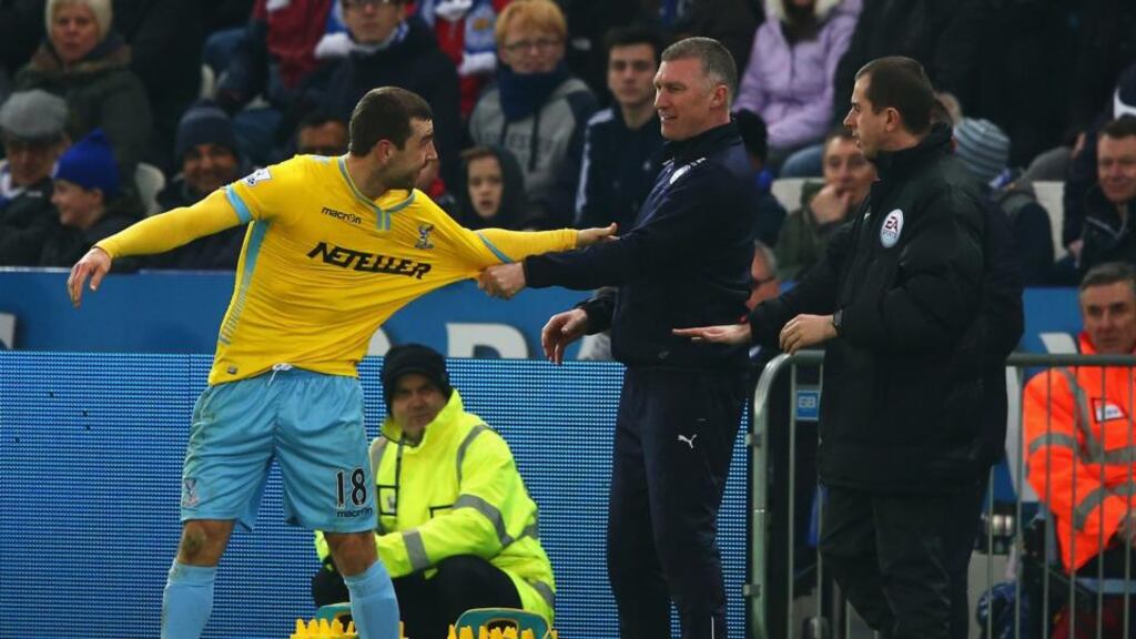 Nigel Pearson, manager of Leicester City exchanges words with James McArthur of Crystal Palace at the King Power Stadium. Photograph: Matthew Lewis/Getty Images