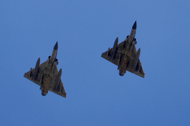 Two Taiwanese Air Force Mirage 2000-5 fighter jets fly by an airbase in Hsinchu, Taiwan on Sunday. Photograph: Ritchie B Tongo/EPA