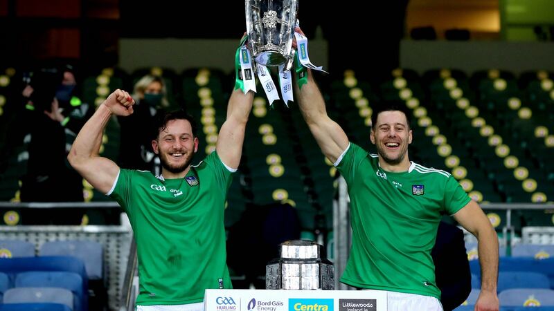 Tom  and Dan Morrissey lift the Liam MacCarthy Cup after last December’s win over Waterford. Photograph: Ryan Byrne/Inpho
