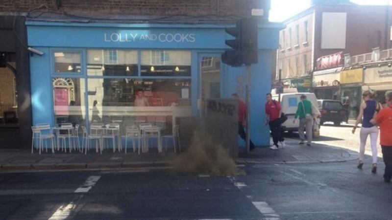 Manhole cover pictured shortly after it exploded. Photograph: Eoin Ó Súilleabháin @eoinos/Twitter