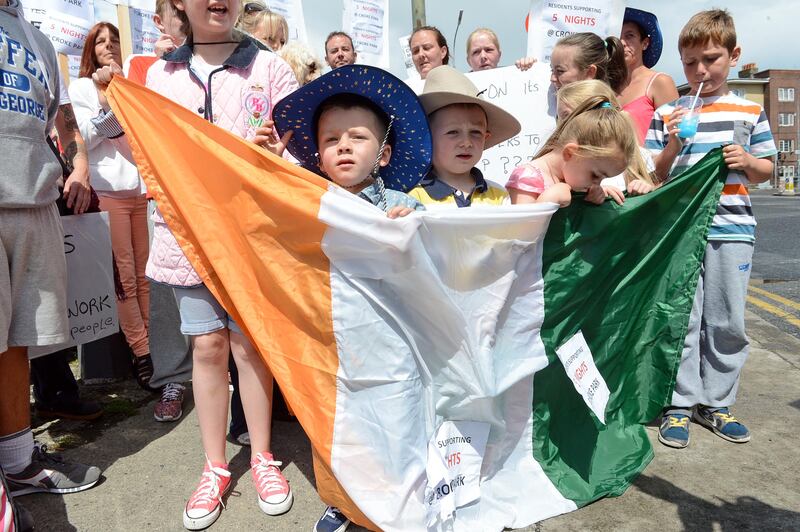 Young Garth Brooks fans with local residents protesting against the cancellation of Croke Park concerts in 2014