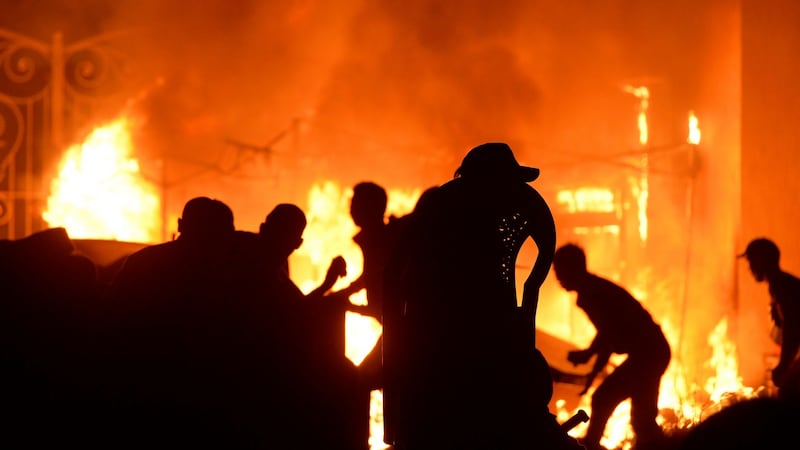 Supporters of Kyrgyzstan’s ex-president Almazbek Atambayev fight with special forces members at his residence in the village of Koi-Tash, Kyrgyzstan. Photograph: Vladimir Voronin/AP