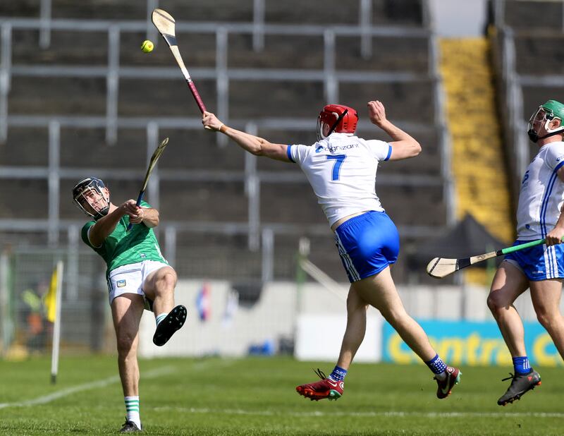 Limerick’s Diarmaid Byrnes shoots under pressure from Waterford’s Jack Fagan during the Munster SHC match at FBD Semple Stadium. Photograph: Ken Sutton/Inpho