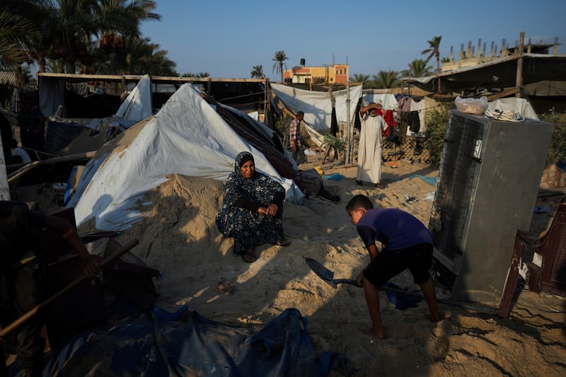 An Israeli strike on a crowded tent camp housing Palestinians displaced by the war in Gaza killed dozens, Palestinian officials said. Photograph: Abdel Kareem Hana/AP