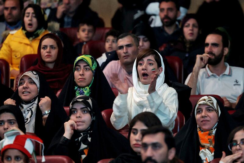Iranian fans watch the match between their national football team and the USA during the Qatar 2022 World Cup, on a giant screen at Milad Tower in the capital Tehran. Photograph: Atta Kenare/AFP
