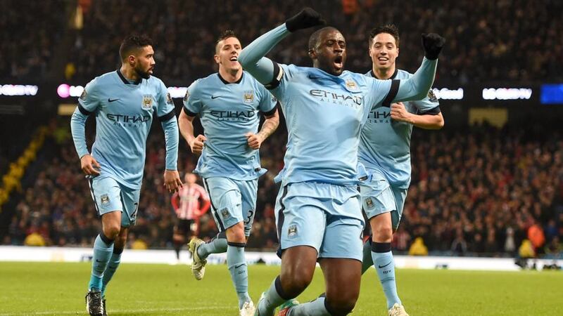 Manchester City’s Yaya Toure celebrates scoring his side’s first goal during the Premier League match against Sunderland at the Etihad Stadium. Photograph: Martin Rickett/PA
