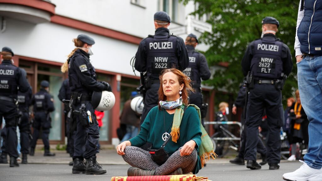 A woman  during a left-wing May Day demonstration in Berlin, Germany. Photograph:   Reuters/Hannibal Hanschke