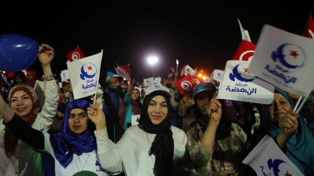Supporters of Rachid Ghannouchi, leader of the Islamist Ennahda party in Tunisia, at an election rally in Slimania, south of Tunis, on Tuesday. Leaders of Ennahda say they overestimated the power of democracy alone to tame violent extremism. Photograph: Mohamed Messara/EPA