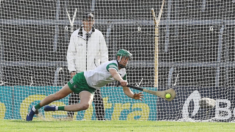 Quaid saves a penalty during the Munster final against Cork. Photo: Lorraine O’Sullivan/Inpho