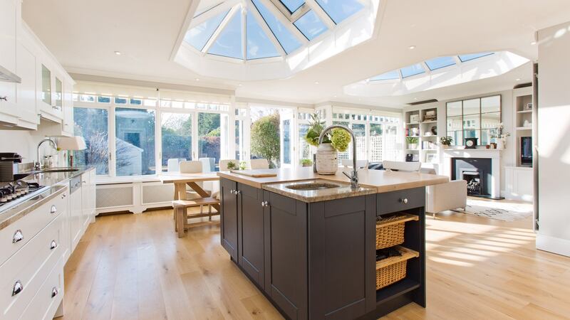 The open-plan kitchen-dining-family room.