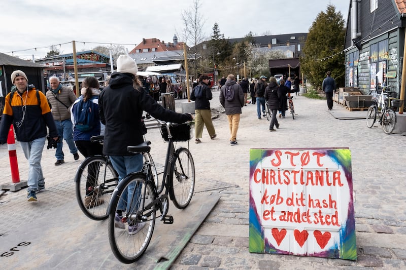 A sign reads: "Support Christiania - buy your hash somewhere else." Photograph: Ricardo Ramirez/NurPhoto via Getty Images