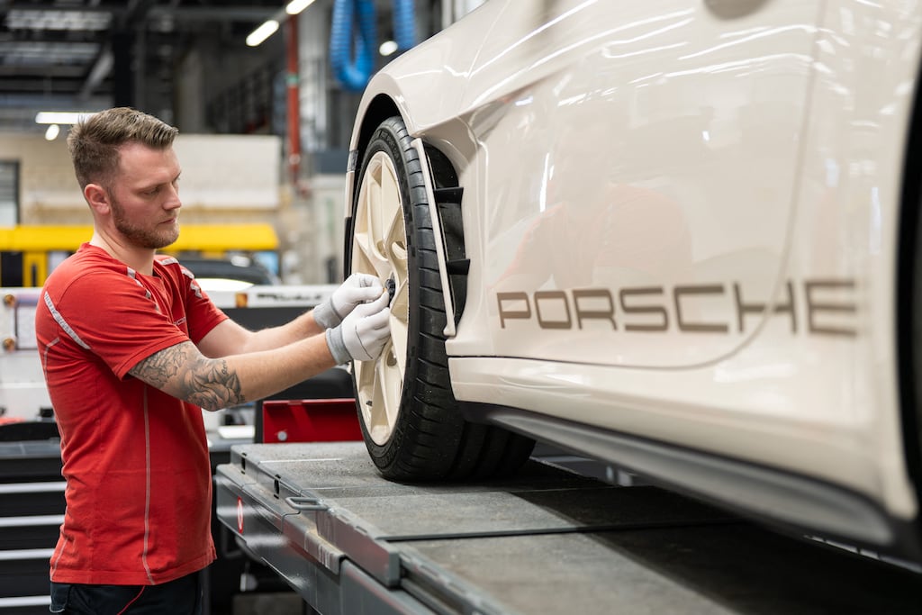 Luxury carmaker Porsche has announced the cancellation of expansion plans at its high performance Cellforce battery subsidiary, letting go around two thirds of the 300-strong workforce. Photograph: Silas Stein/AFP
