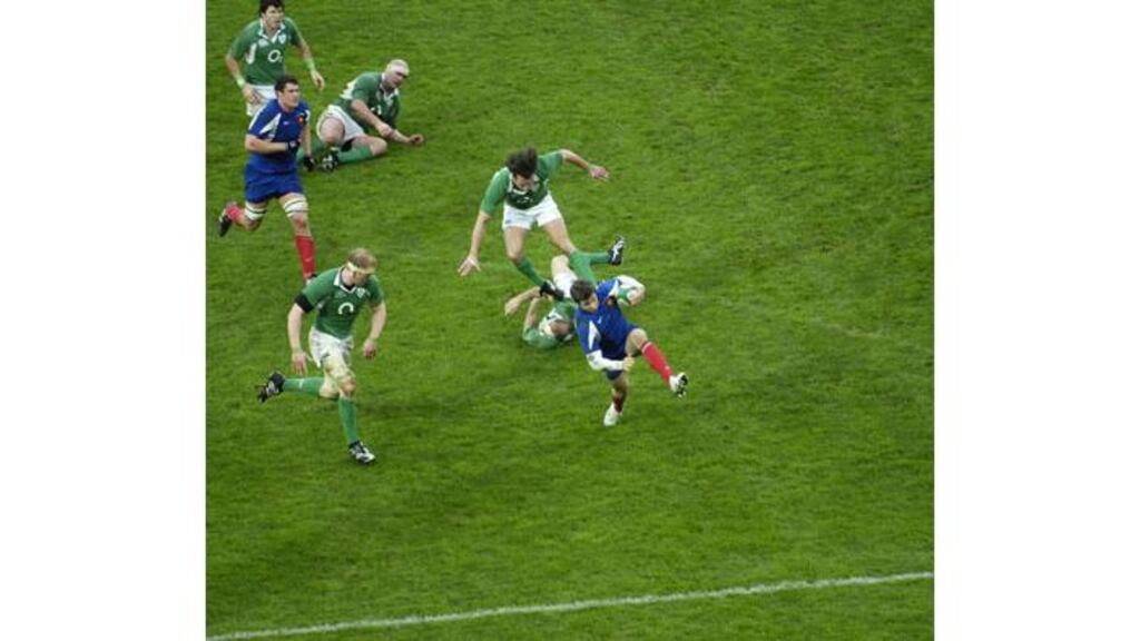 France's Vincent Clerc spoils the Croke Park celebrations with a
last minute try against Ireland.