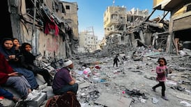 Palestinians dig for the dead in multi-storey ruins as Israel hammers north Gaza