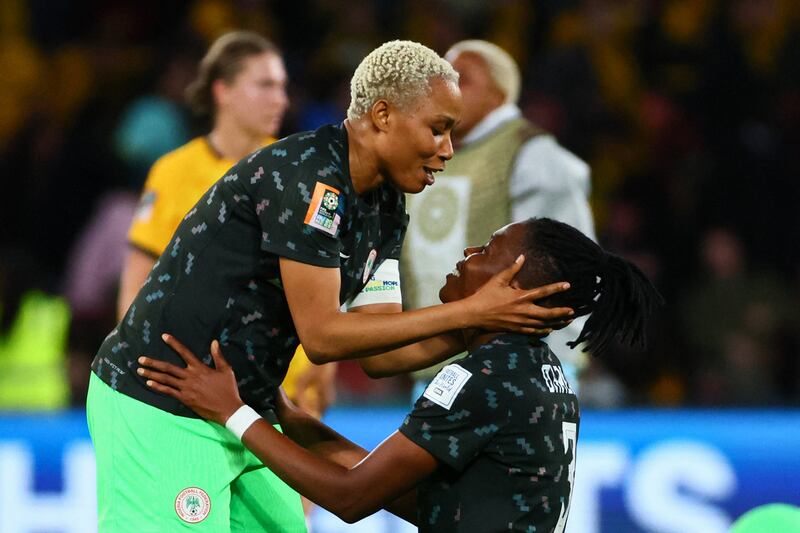 Onome Ebi (left) and Osinachi Ohale celebrate their team's victory. Photograph: Patrick Hamilton/AFP via Getty Images)