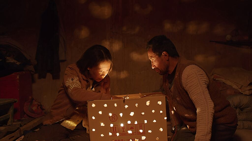 Hai-Qing and Renlin Wu in Return to Dust