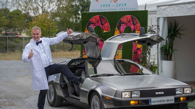 Back to the future: Rose of Tralee host Dáithí O’Sé poses with a DeLorean ahead of the show. Photograph: Domnick Walsh