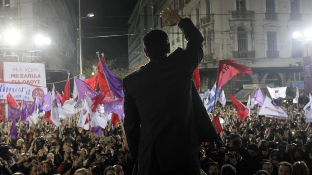 ‘A victory for the hard left in Greece will demonstrate once and for all what happens when “anti-austerity” political forces achieve power in an EU state.’ Above, head of the Syriza party Alexis Tsipras waves to his supporters during a party election rally in central Athens this week. Photograph: ORESTIS PANAGIOTOU/AFP/Getty Images