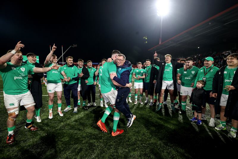 Ireland's Evan O'Connell and kit man Lar Hogan celebrate the victory over Scotland in the Under-20 Six Nations Championship at Musgrave Park. Photograph: Ben Brady/Inpho