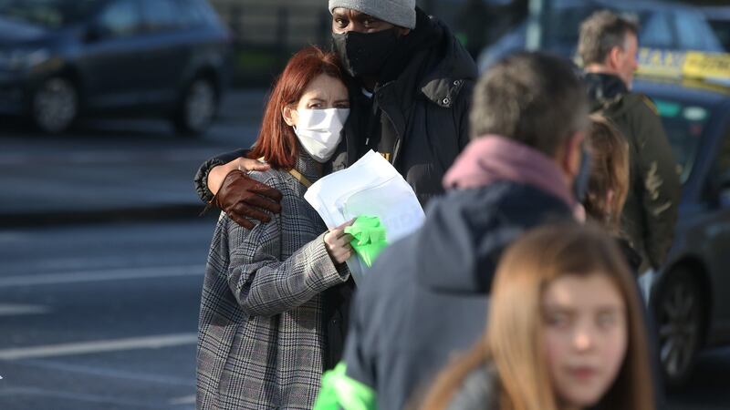 Jamie Quinn, the mother of Alanna Quinn Idris, is consoled at a vigil in Ballyfermot. Photograph: Stephen Collins/Collins Photos