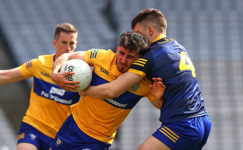 Clare's Aaron Griffin is tackled by Roscommon's Conor Daly during the qualifier at Croke Park. Roscommon's defensive shortcomings have proved their Achilles heel in recent years. Photograph: Bryan Keane/Inpho