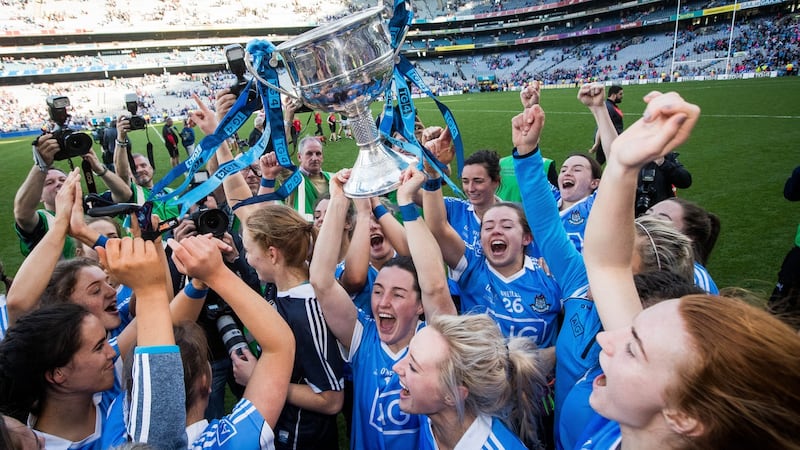 Dublin’s Lydsey Davey and her team-mates celebrate with the Brendan Martin Cup  after the All-Ireland final win over Mayo at Croke Park. Photograph: Ryan Byrne/Inpho