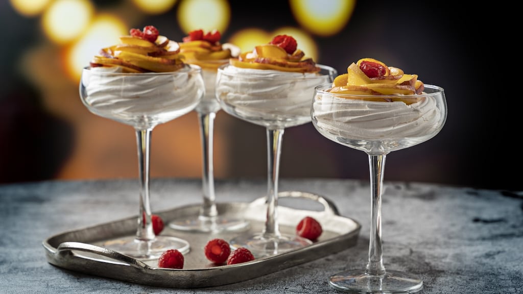 Peach Melba meringue nests. Photograph: Harry Weir