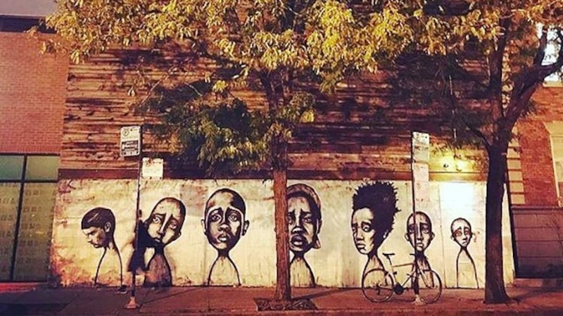 The Violet Hour: hidden beneath the ever-changing mural on the wooden building across from Big Star