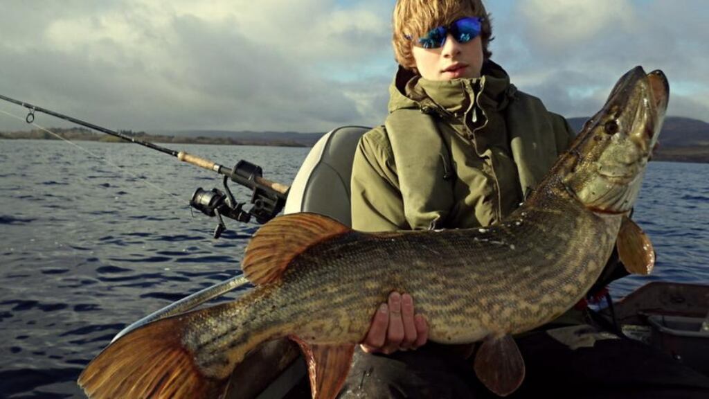 Essex angler William Sudders (15), with the enormous pike of 9kg (20lb) he took from Lough Conn in Co Mayo