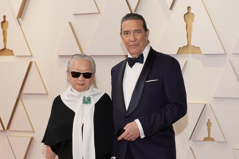 Hélène Patarot and Ciarán Hinds attending the Oscars in 2022; he was nominated for Belfast. Photograph: Mike Coppola/Getty Images