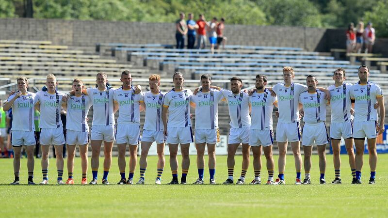 Wicklow team stand for the national anthem. Photograph: Inpho/Donall Farmer