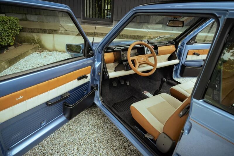 The simple, un-upholstered doors mean that there’s body colour on the inside too