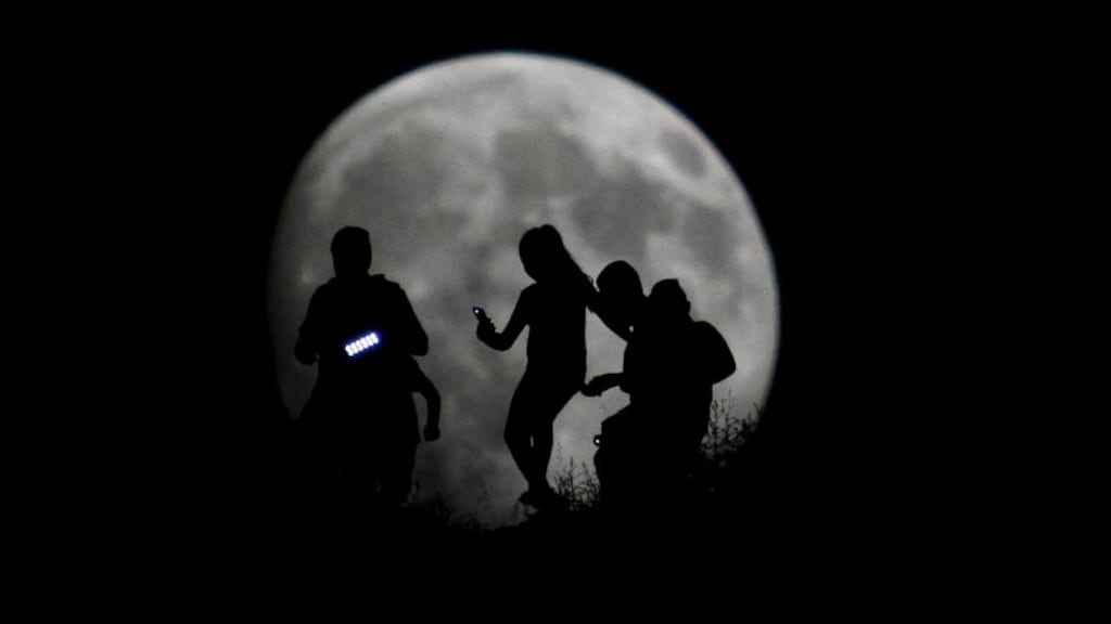 There wasn’t much progress on the moon-mining front. (Above, a group of hikers are seen silhouetted against the moon in Tijuana, Mexico.) Photograph: Jorge Duenes/Reuters
