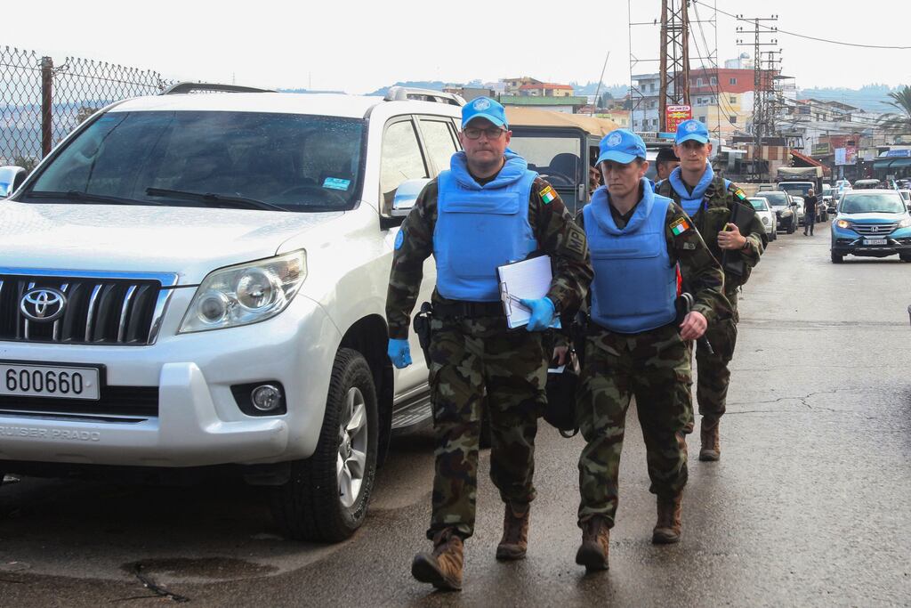 Irish UN peacekeepers check the site where a UN peacekeeping force UNIFIL convoy came under small arms fire, in the village of Aqibya in south Lebanon, on December 15th, 2022. Photo by Mahmoud ZAYYAT / AFP via Getty Images