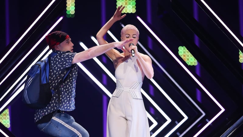 A fan invades the stage during the performance by SuRie representing the United Kingdom with ‘Storm’ during the Grand Final of the 63rd annual Eurovision Song Contest in Lisbon, Portugal. Photograph: Sena Goulao