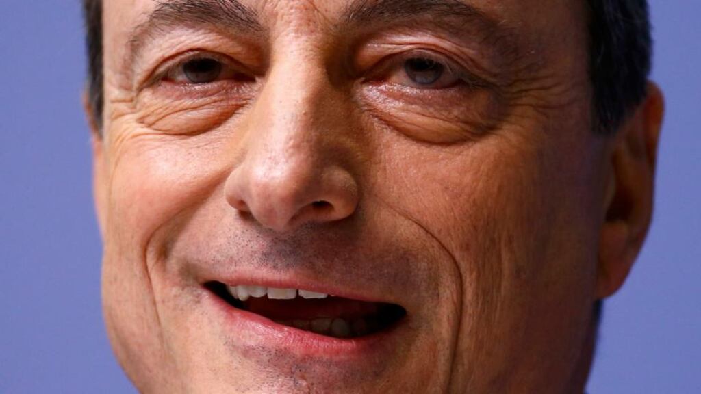 ECB chief Mario Draghi said the intervention would continue “until we see a sustained adjustment in the path of inflation which is consistent with our aim”. Photograph: Michael Probst/AP