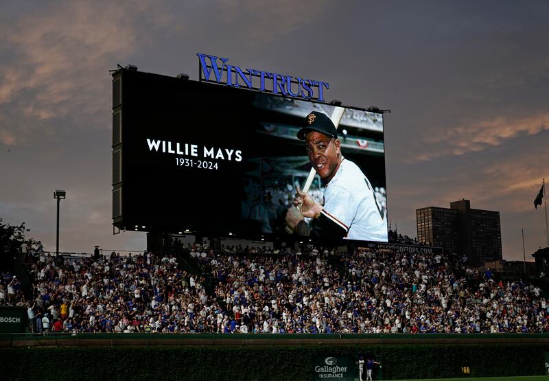An image of Willie Mays is displayed on the video board while everyone observed a moment of silence during the sixth inning of a game between the Chicago Cubs and the San Francisco Giants at Wrigley Field in Chicago on Tuesday night. Photograph: Nuccio DiNuzzo/Getty Images