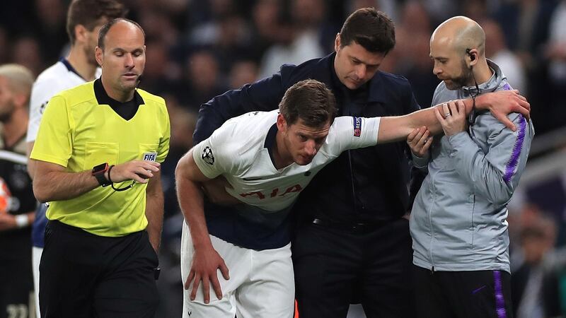 Jan Vertonghen struggles to stand after leaving the pitch following a blow to the head. Photo: Mike Egerton/PA Wire
