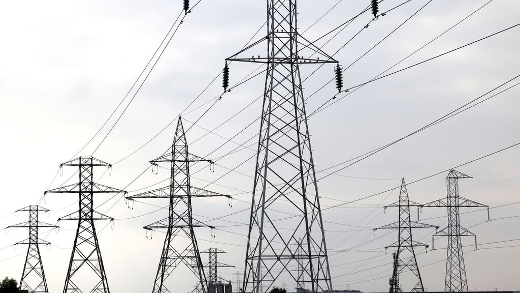 Electricity Pylons near the Naas Road in Dublin. “Network charges”, for maintaining the State’s electricity grid, account for almost one third of the total electricity bill paid by households. Photograph: Alan Betson