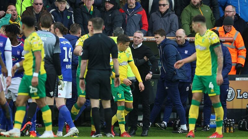 Tempers flare on the bench as Ipswich manager Paul Lambert is shown a red card. Photo: Nigel French/PA Wire