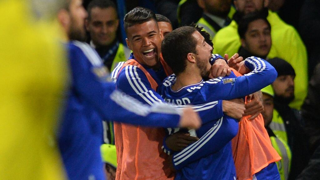 Chelsea’s Belgian midfielder Eden Hazard celebrates scoring against Tottenham Hotspur at Stamford Bridge. Photograph: Getty Images
