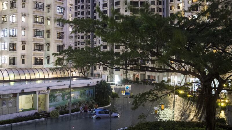 A vehicle partially submerged in floodwaters at the Heng Fa Chuen residential estate during Typhoon Mangkhut in Hong Kong. Photograph: Justin Chin/Bloomberg