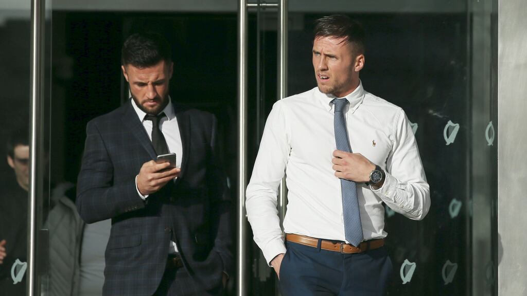 Scottish soccer players Liam Gallaghan, (Left) and Craig Johnston(right), of Moss Green Street, were remanded on bail on Friday at Dublin District Court. Photograph: Collins Courts
