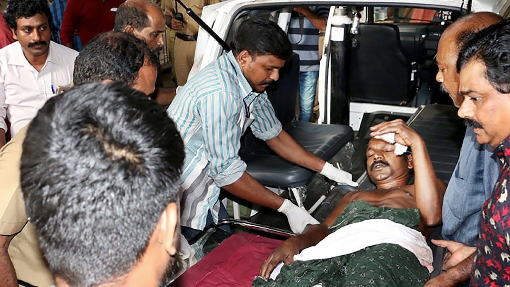 An injured man after an explosion and fire at the Puttingal temple in the Kollam district of the southern Indian state of Kerala on Sunday. Photograph: Getty/AFP