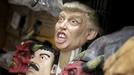 Vet who wore Trump mask to work challenges removal from duties