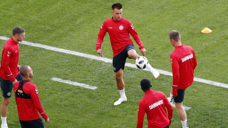 Denmark’s Jonas Knudsen on the ball during Denmark training. Photograph: Jack Guez/AFP