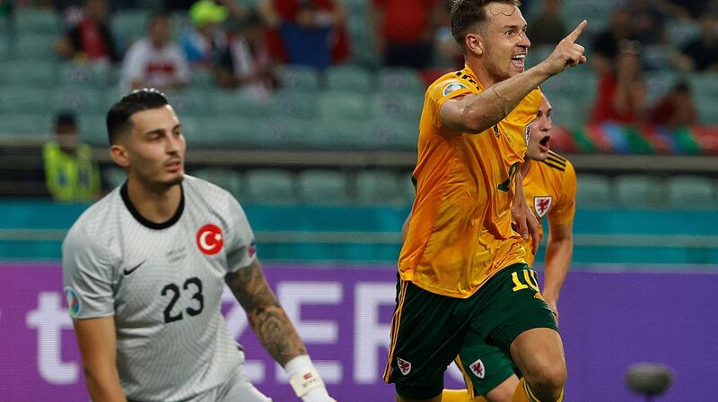 Aaron Ramsey celebrates after scoring Wales’s opener against Turkey. Photograph: Valentyn Ogirenko/Getty/AFP