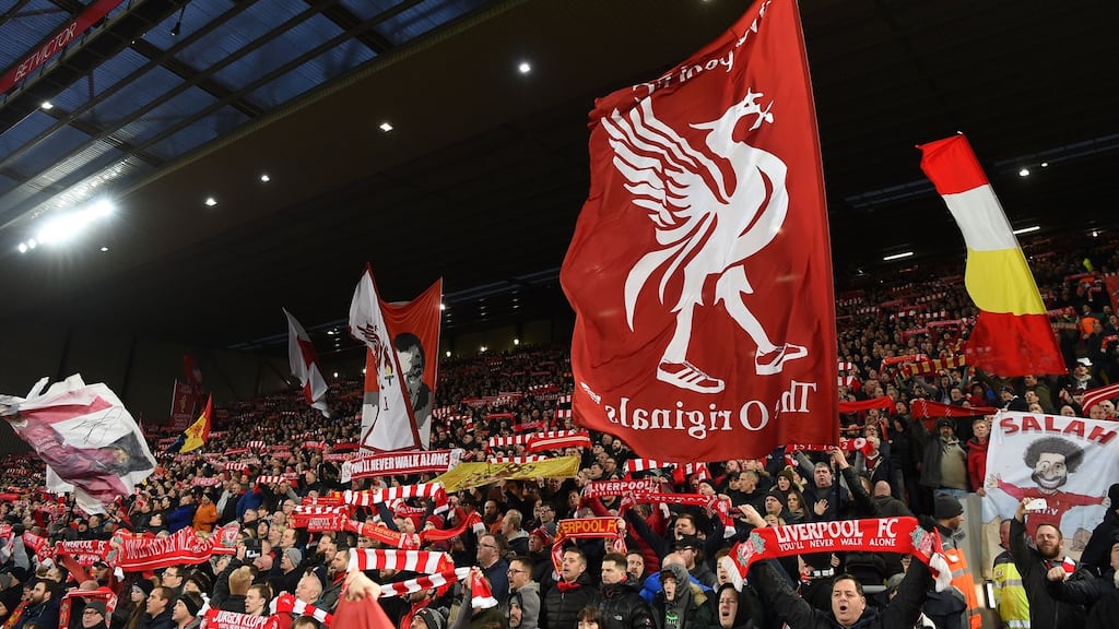 Leicester City had just scored a second, late goal against Manchester City. At Anfield, the news was embraced like a lost medal. Photograph: Paul Ellis/AFP/Getty Images